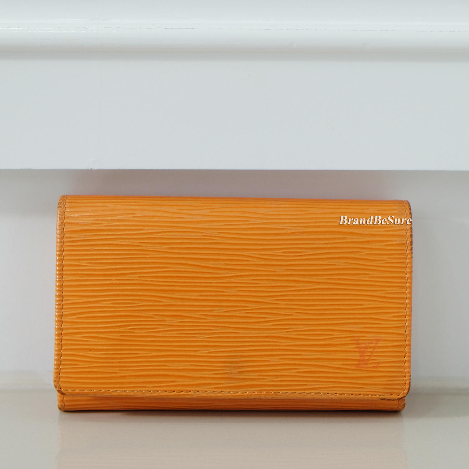 Leather wallet Louis Vuitton Orange in Leather - 11699461